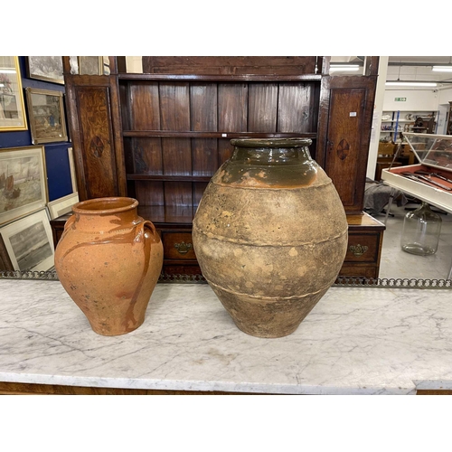 117 - Gardenalia: Gardenalia: 20th cent. Terracotta Continental olive oil jars x 2, tallest 50cm... 