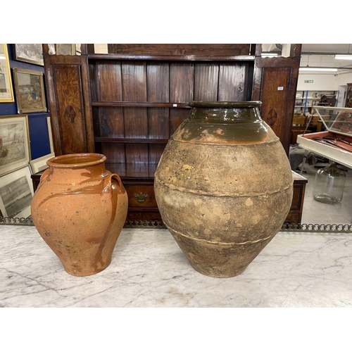 117 - Gardenalia: Gardenalia: 20th cent. Terracotta Continental olive oil jars x 2, tallest 50cm... 