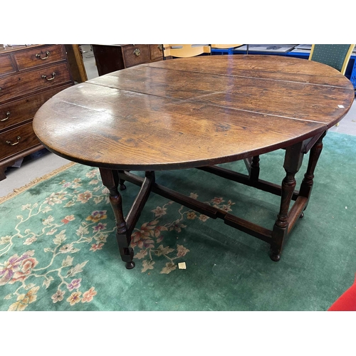 121 - Furniture: Furniture: Late 18th century English oak gate leg table with original drawer to end rail.... 