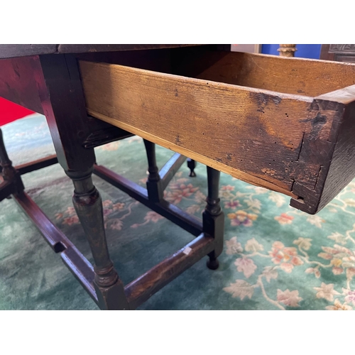 121 - Furniture: Furniture: Late 18th century English oak gate leg table with original drawer to end rail.... 