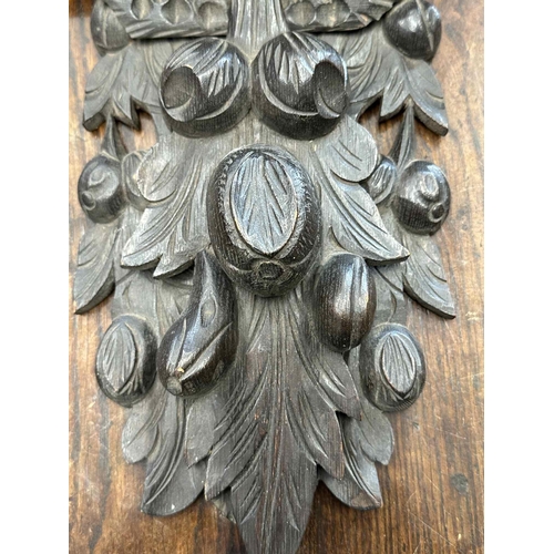 122 - Furniture Furniture: A large 19th-century black forest wall bracket in the form of a chip carved eag... 