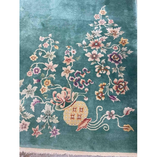 124 - Carpets & Rugs: Carpets & Rugs: Late 20th cent. Washed Chinese carpet, green ground decorated wi... 