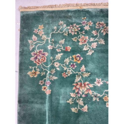 124 - Carpets & Rugs: Carpets & Rugs: Late 20th cent. Washed Chinese carpet, green ground decorated wi... 