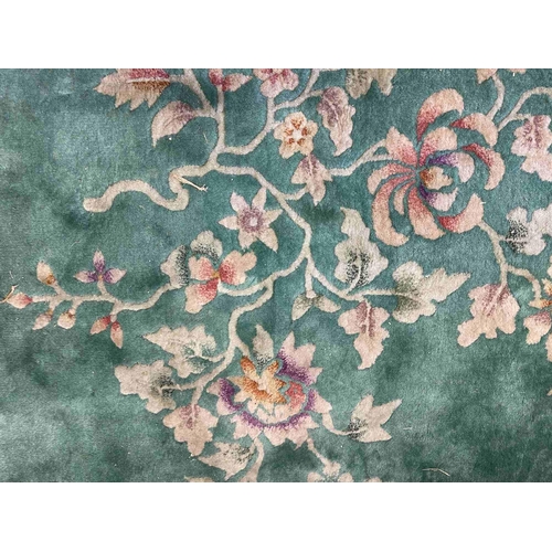 124 - Carpets & Rugs: Carpets & Rugs: Late 20th cent. Washed Chinese carpet, green ground decorated wi... 