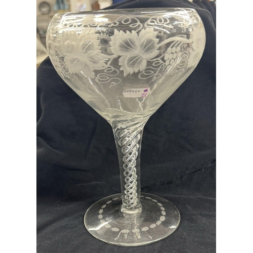 245 - Glassware: 19th Century oversized wine goblet with a double air twist stem, the bowl wheel engraved ... 