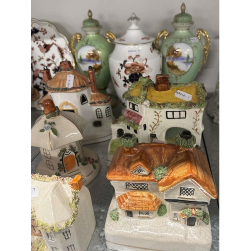 251 - Ceramics: Ceramics: A group of ten cottage pastille burners, both 19th and 20th century, together wi... 