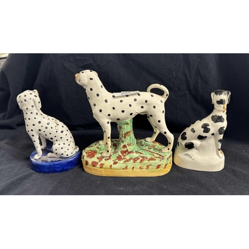 260 - 19th cent. Ceramics: 19th cent. Ceramics: Three Staffordshire figures of Dalmatian dogs, one standin... 