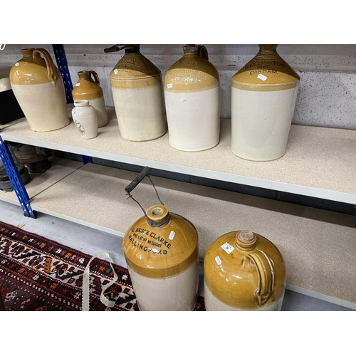 28 - Kitchen: Kitchen: A group of 8 stoneware vessels some with stoppers and handles. Late 19th cent. c18... 