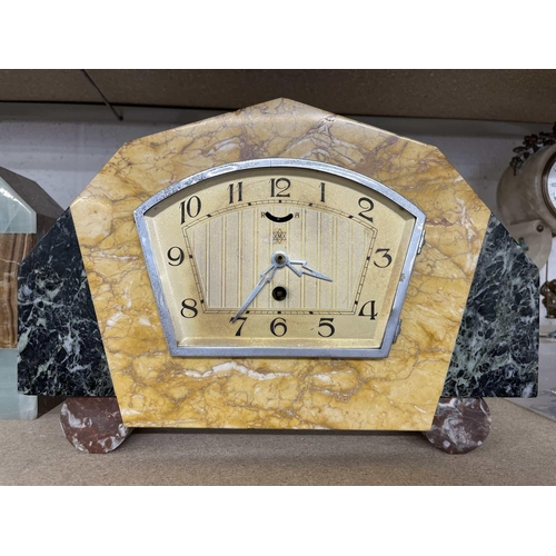 34 - Clocks: Clocks: A group of Art Deco period marble mantel clocks.