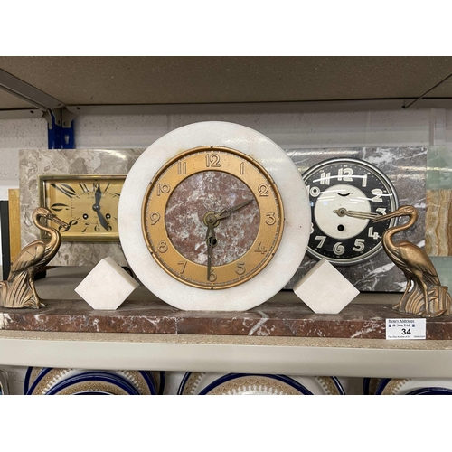 34 - Clocks: Clocks: A group of Art Deco period marble mantel clocks.