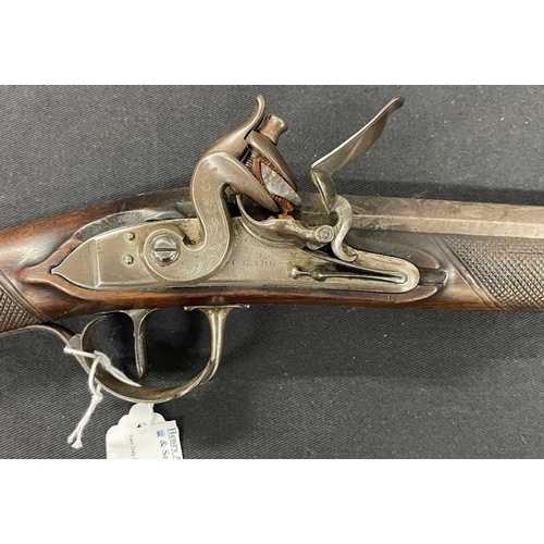 344 - Firearms: Firearms: Flintlock smooth bore musket, rounded lock chased decoration to lock plate and t... 