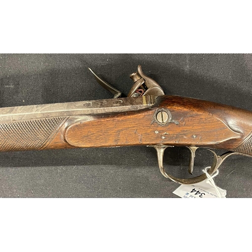 344 - Firearms: Firearms: Flintlock smooth bore musket, rounded lock chased decoration to lock plate and t... 