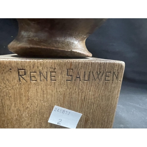 417 - Sculpture: Sculpture: Carved treen head of a child signed Rene Sauwen, 36cm.