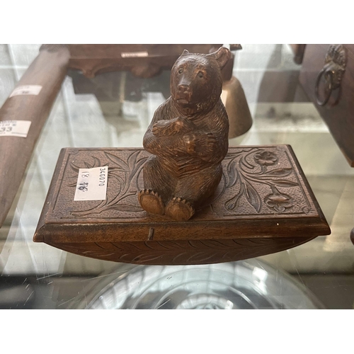 433 - Treen: Treen: 19t/20th cent. Carved Black Forest bear page turner, inkwell/pen stand, bell and blott... 