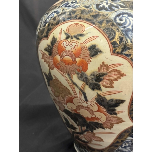 437 - Pottery Pottery: A large Japanese imari porcelain vase. circa 1800. height 44cm