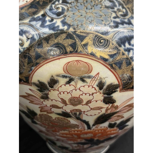 437 - Pottery Pottery: A large Japanese imari porcelain vase. circa 1800. height 44cm