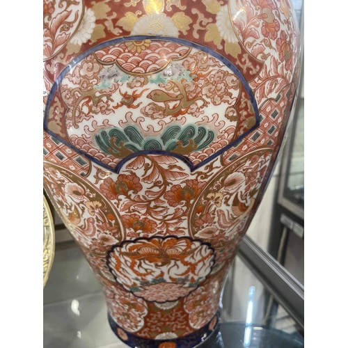 439 - Oriental: Oriental: A Japanese Imari decorated baluster vase, probably early 20th century, decorated... 