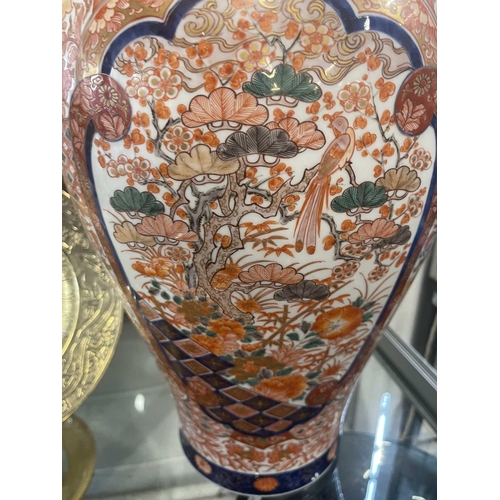 439 - Oriental: Oriental: A Japanese Imari decorated baluster vase, probably early 20th century, decorated... 