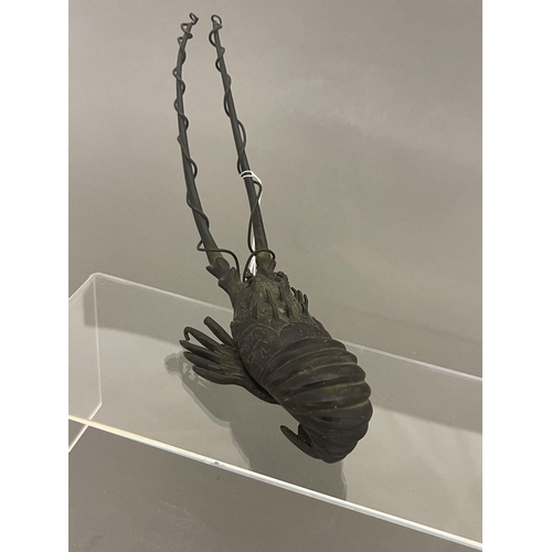 441a - Oriental: Oriental: A Japanese patinated bronze model of a crayfish., 19.5cm.