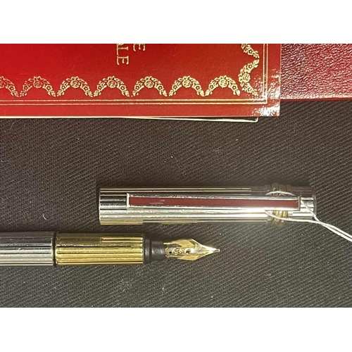 450 - Desktop Requisites: Desktop Requisites: A boxed Must De Cartier silver plated Stylo Plume fountain p... 