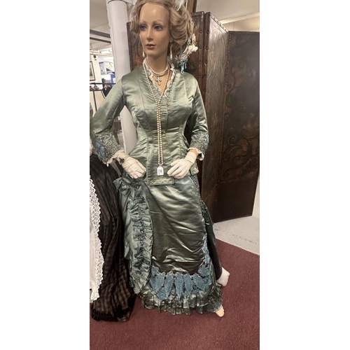 453 - Costume: Costume: Late Victorian day dress decorated with lace ruffles and beadwork, sea green colou... 