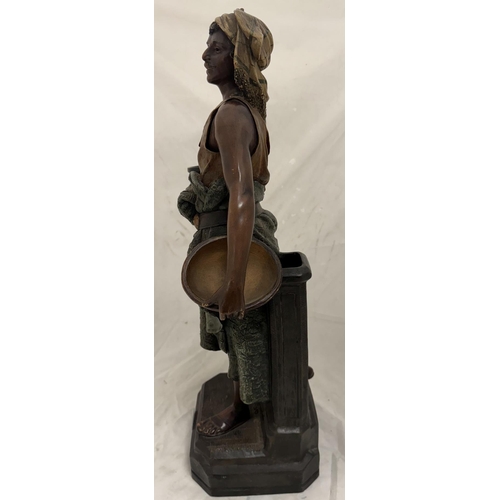 547 - Ceramics: Ceramics: An Austrian polychromed terracotta figure of a water carrier by Johann Maresch,m... 