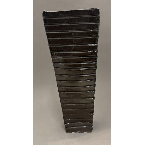 554 - Ceramics: Ceramics: A stoneware tapering ribbed vase by Bruce McLean, with thick brown glaze. Unmark... 