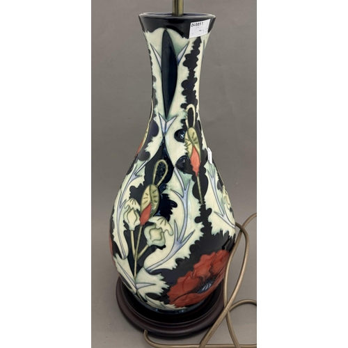 558 - Ceramics: Ceramics: A Moorcroft Pottery lamp decorated in the New Poppy pattern, designed by Rachel ... 