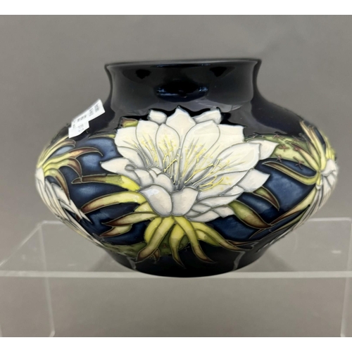 559 - Ceramics: Ceramics: A Moorcroft Pottery squat vase in the 'Queen of The Night' pattern designed by A... 