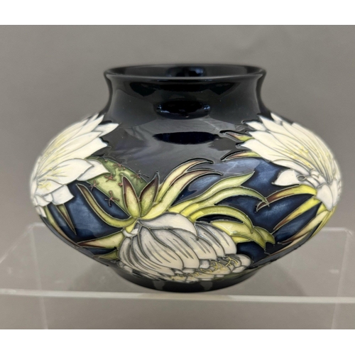 559 - Ceramics: Ceramics: A Moorcroft Pottery squat vase in the 'Queen of The Night' pattern designed by A... 