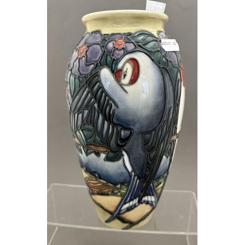 560 - Ceramics: Ceramics: A Moorcroft Pottery limited edition vase in the Swallow pattern, numbered 4 of 5... 