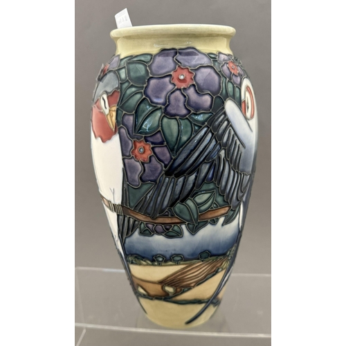 560 - Ceramics: Ceramics: A Moorcroft Pottery limited edition vase in the Swallow pattern, numbered 4 of 5... 