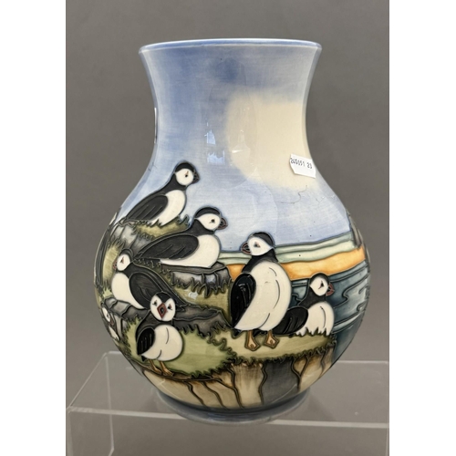 561 - Ceramics: Ceramics: A Moorcroft pottery Puffin vase, designed by Carole Lovett, dated 1997. Printed ... 