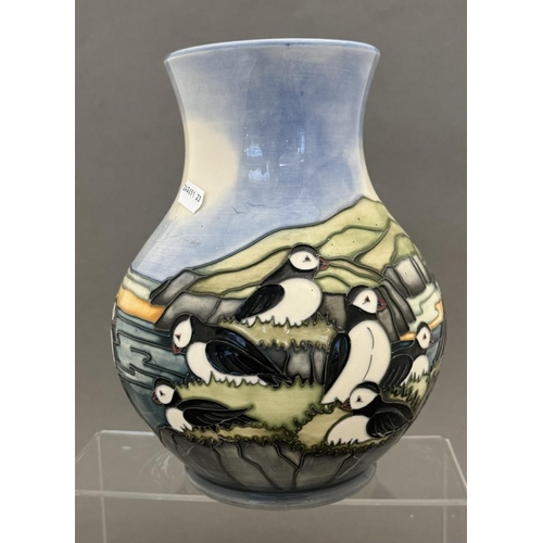 561 - Ceramics: Ceramics: A Moorcroft pottery Puffin vase, designed by Carole Lovett, dated 1997. Printed ... 