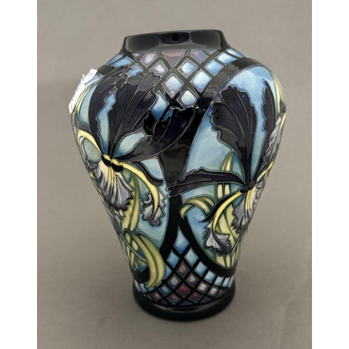 565 - Ceramics: Ceramics: A Moorcroft Pottery Siberian Iris pattern vase, designed by Sian Leeper. Limited... 