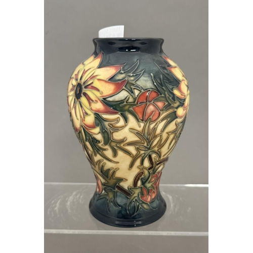 567 - Ceramics: Ceramics: A Moorcroft Pottery baluster vase decorated in the Spike pattern, designed by Ra... 