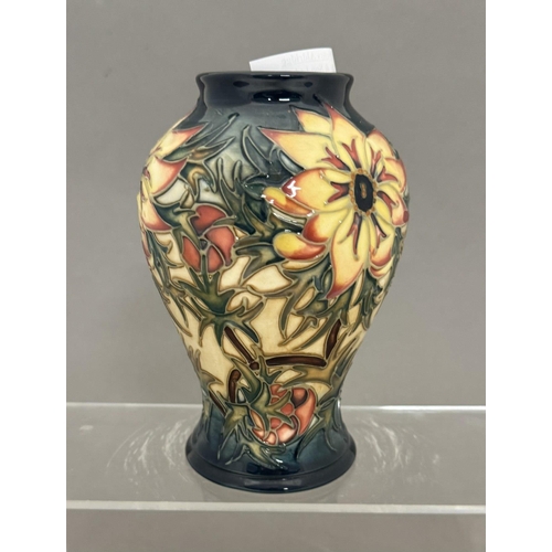 567 - Ceramics: Ceramics: A Moorcroft Pottery baluster vase decorated in the Spike pattern, designed by Ra... 