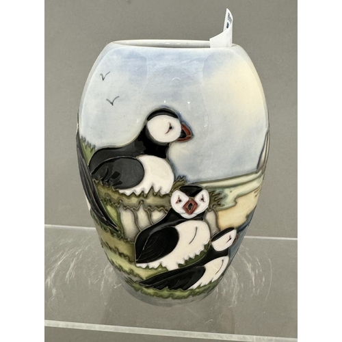 568 - Ceramics: Ceramics: A Moorcroft Pottery Puffin vase, designed by Carole Lovett, dated 1997. Printed ... 