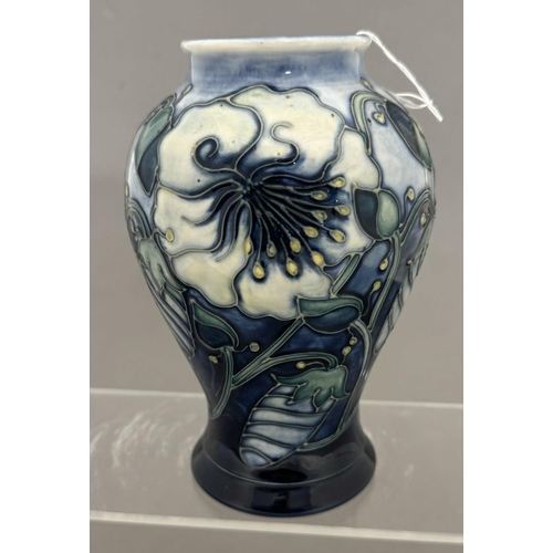 574 - Ceramics: Ceramics: A 1996 Tansy Pattern baluster vase, designed by Rachel Bishop for Moorcroft Pott... 