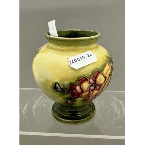 575 - Ceramics: Ceramics: A Moorcroft Pottery miniature vase painted in the Spring Flowers pattern to a ye... 