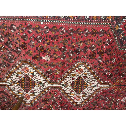 58 - Rugs: Rugs: Vintage Persian rug handknotted, heavy wool ground with stylised motifs around geometric... 