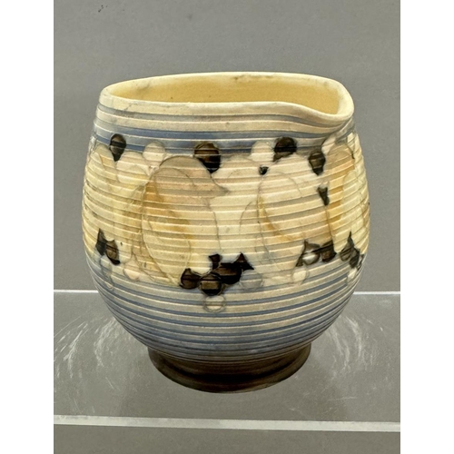 582 - Ceramics: Ceramics: A Moorcroft Pottery ribbed jug in an Autumnal pattern, possibly a trial piece. I... 