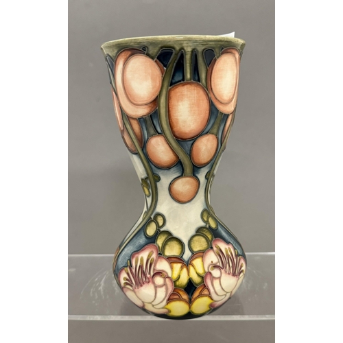 585 - Ceramics: Ceramics: A 2003 Trial Moorcroft Pottery Cannonball Tree pattern tube lined vase of waiste... 