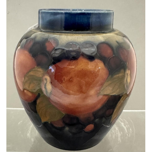 588 - Ceramics: Ceramics: A Moorcroft Pottery baluster vase in the Pomegranate pattern, impressed marks an... 