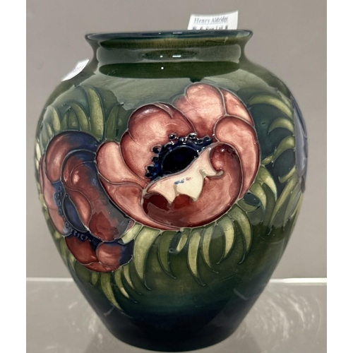 590 - Ceramics: Ceramics: A Moorcroft Pottery Anemone pattern squat vase, with tube lined decoration to a ... 