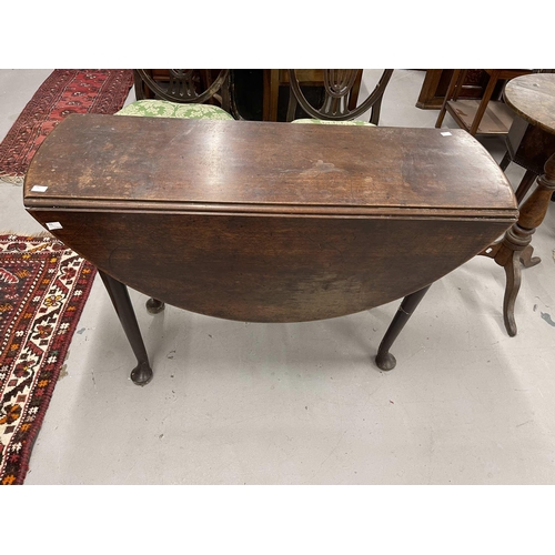 61 - Furniture: Furniture: George III mahogany drop leaf table, the oval top above a gate leg action with... 