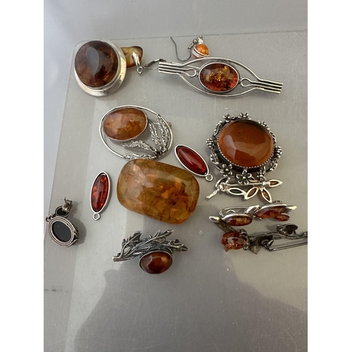 637 - Jewellery: Jewellery: Hallmarked silver and white metal mainly set with amber, three amber necklets ... 