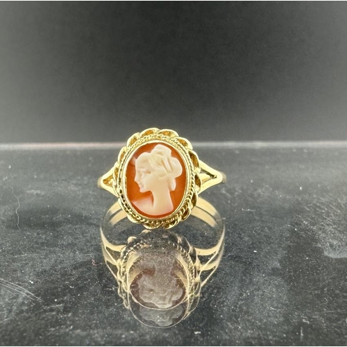 654 - Hallmarked Jewellery: Hallmarked Jewellery: 9ct gold cameo ring, size O, 2.2g. Plus a silver bracele... 