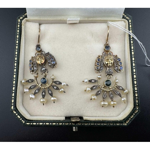 656 - Jewellery: Jewellery; A boxed pair of Egyptian revival yellow metal drop earrings, set with diamonds... 