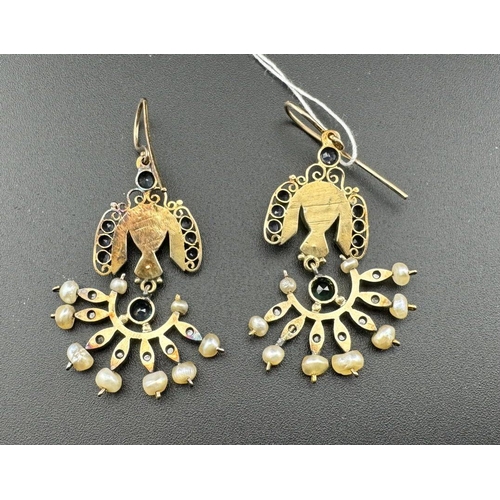 656 - Jewellery: Jewellery; A boxed pair of Egyptian revival yellow metal drop earrings, set with diamonds... 